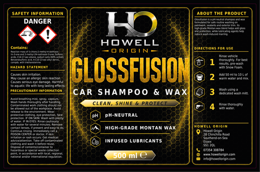 A 500 ml bottle of Howell Origin Glossfusion Car Shampoo & Wax, featuring a black and gold label with safety information, directions, and product features.
